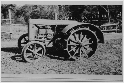 1933 – The farm purchased this used Shaw Duall tractor in 1933. This was the first tractor the farm owned. The spikes in the rear steel wheels made it difficult to maneuver on our rocky soil. And there were no brakes when pulling a load. It was used for one year.