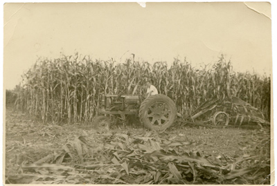 1936 – Winthrop Shaw pulling a “bundle loader” with an F-12 Farm-All, which the farm purchsed new in 1934, replacing the Shaw Duall.
