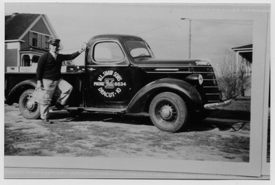 1937 – Albert Shaw with the newest of the fleet, a 1937 International pick up truck.