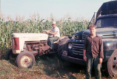 Warren Shaw Sr. and Jr. – Approximately Fall 1965, Warren Sr. and Warren Jr. posed for this image while chopping corn.