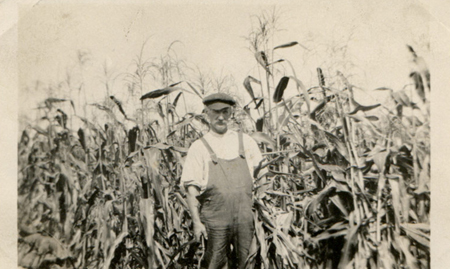 1929 – ML Sr. in front of a fine crop of corn.